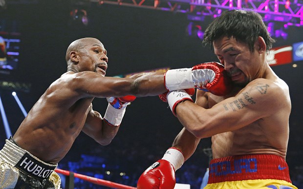 Mayweather đánh bại Pacquiao bằng tính điểm sau 12 hiệp