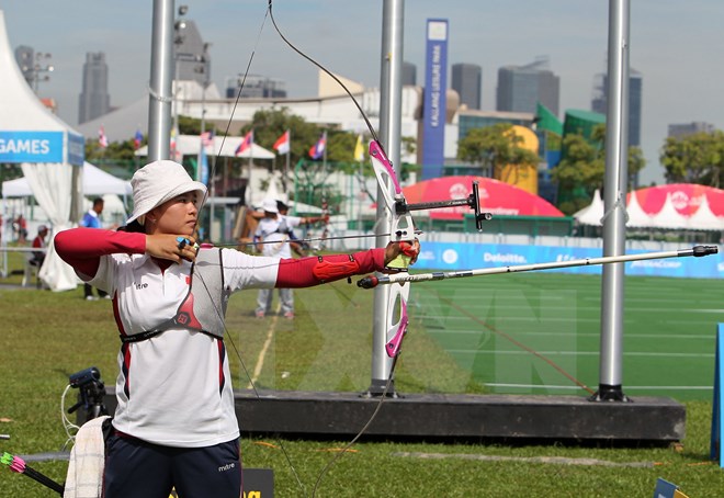 Các cung thủ Việt Nam giành huy chương vàng. (Ảnh: TTXVN)