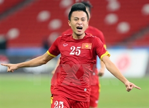 Vo Huy Toan celebrates after scoring a goal 