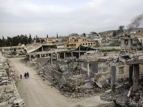 Một ngôi làng tại thị trấn Kobane, Syria bị phá hủy ngày 27/3/2015. (Nguồn: AFP/TTXVN)