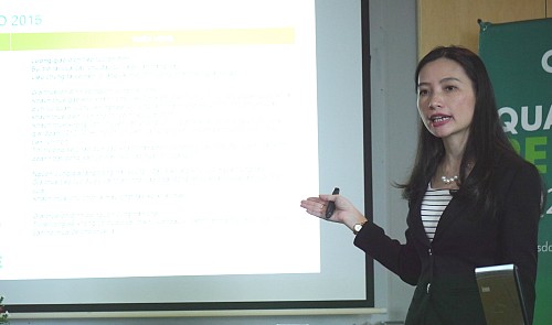 Duong Thuy Dung, director of the research and consulting department of U.S.-owned realty consultant firm CBRE Vietnam, gives a presentation about the prospects of the local realty market in the second half of 2015 and beyond at a conference in Ho Chi Minh City on June 30, 2015.