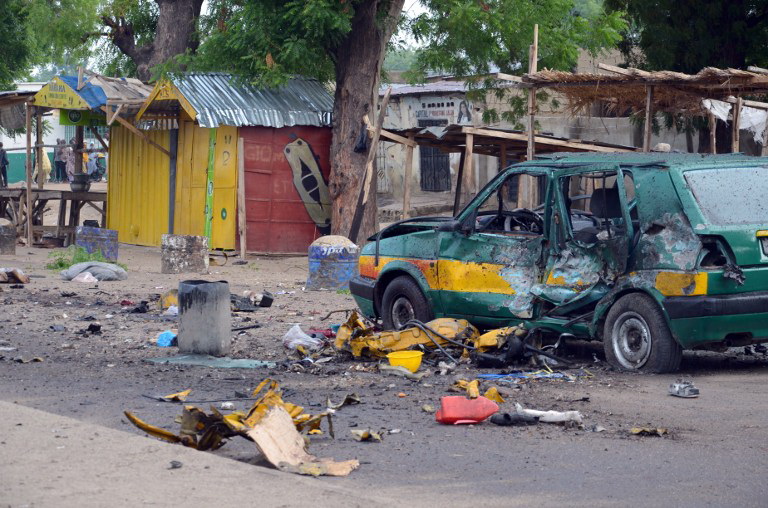 Hiện trường vụ đánh bom một khu chợ ở Maiduguri, bang Borno, Nigeria, ngày 31/7. (Nguồn: AFP)