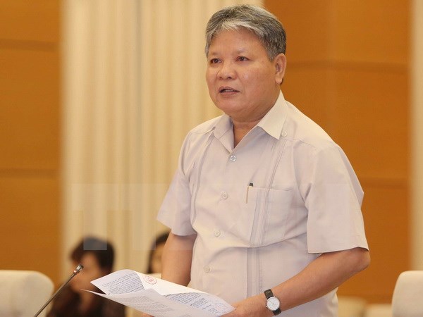 Bộ trưởng Bộ Tư pháp Hà Hùng Cường phát biểu ý kiến về dự án Bộ luật Dân sự (sửa đổi). (Ảnh: TTXVN)