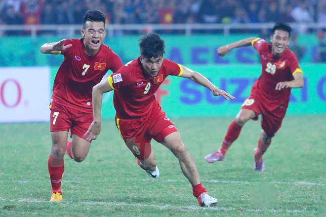 Công Vinh ăn mừng bàn thắng ghi được vào lưới Indonesia ở AFF Cup 2014. (Ảnh: Vietnam+)