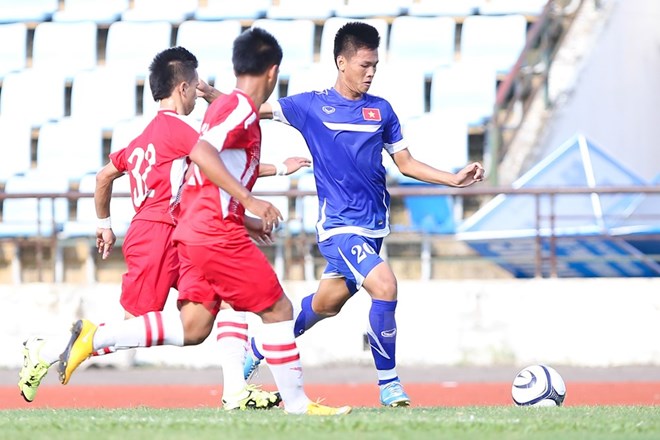 U19 Việt Nam (áo xanh) ở trận giao hữu với U19 Lào. (Ảnh: Vietnam+)