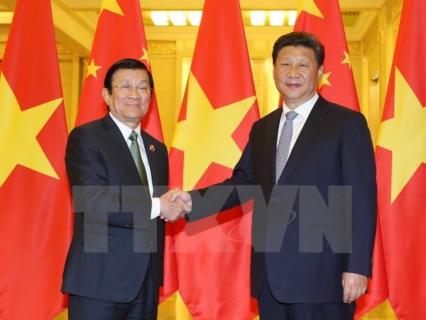 State President Truong Tan Sang meets Chinese Party General Secretary and State President Xi Jinping 