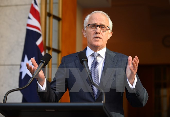 Thủ tướng Australia Malcolm Turnbull trả lời báo giới sau khi công bố nội các mới ở thủ đô Canberra ngày 20/9. (Ảnh: AFP/TTXVN)