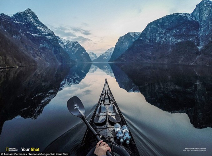  This image was captured in wintertime after sunset when the shooter went kayaking where Aurlandsfjord meets Nærøyfjord in Norway 