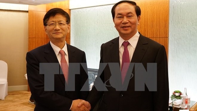 Minister of Public Security Tran Dai Quang (right) and Secretary of the Chinese Party Committee’s Commission for Political and Legal Affairs Meng Jianzhu