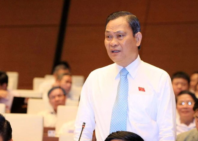 Bộ trưởng Bộ Nội vụ Nguyễn Thái Bình trả lời câu hỏi chất vấn của đại biểu Quốc hội. (Ảnh: Doãn Tấn/TTXVN)