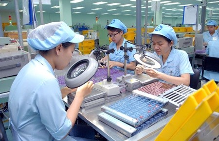 Workers make small motors at a factory run by the Mabuchi Motor Viet Nam Co in the southern province of Dong Nai.