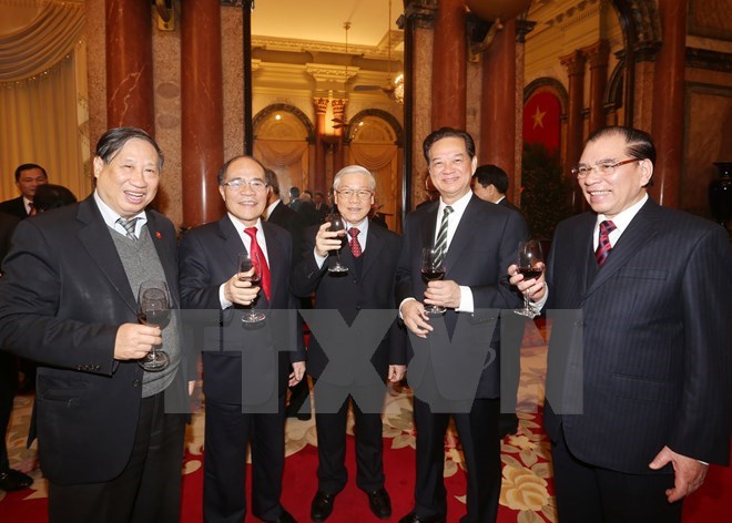 Party General Secretary Nguyen Phu Trong (centre) and incumbent and former leaders of the Party and State at the gathering on Feb. 3