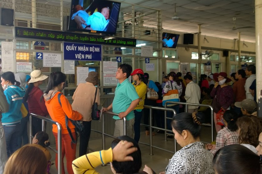 Patients wait to be examined at a Ho Chi Minh City hospital on March 1, 2016.