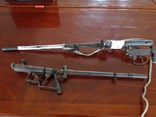 A homemade gun seized from the duo.