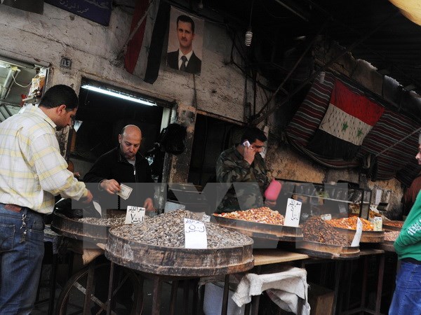 Người dân Syria được trở lại hoạt động thường nhật hàng ngày tại Damascus ngày 27/2, sau khi lệnh ngừng bắn có hiệu lực. (Nguồn: THX/TTXVN)