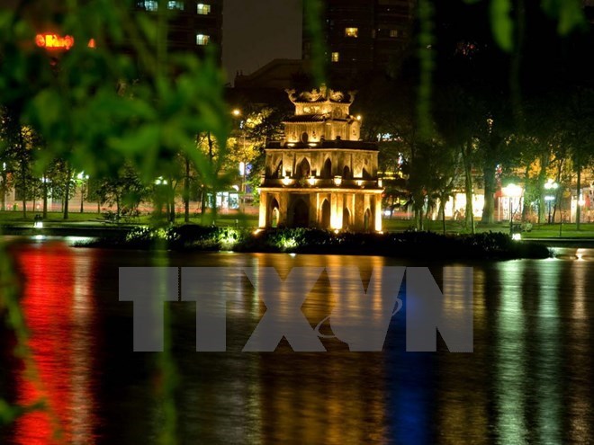 ​Turtle Tower on Hoan Kiem Lake, an incon of Hanoi (Photo: VNA)