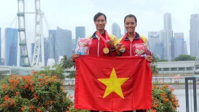 Pham Thi Thao (L) and Ta Thanh Huyen (R) have won two gold medals at the SEA Games 28. (Credit: zing.vn)