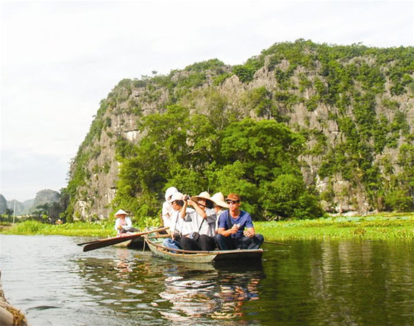 Simple wooden boats in Tam Coc