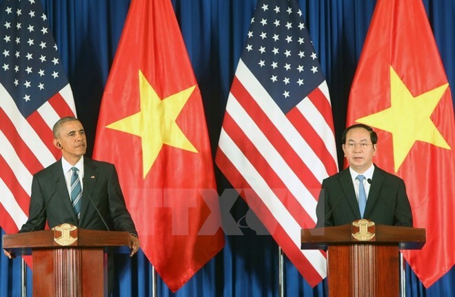 US President Barack Obama and Vietnamese counterpart Tran Dai Quang at the joint press conference following their talks on May 23.