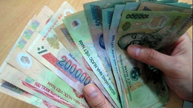 Basic wage raised to VND1.21 million per month from May 1