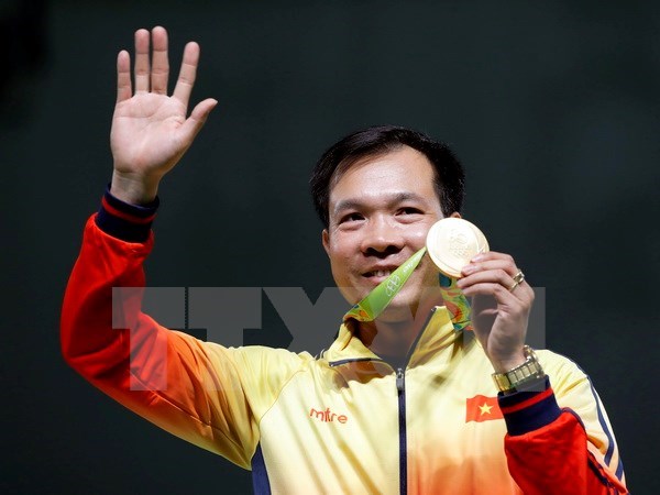 Hoang Xuan Vinh won the first-ever Olympic gold medal for Vietnam (Photo: EPA/VNA)