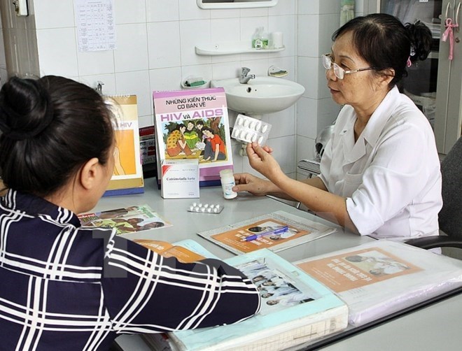 A woman living with HIV receives medical consultation in Ha Long city 