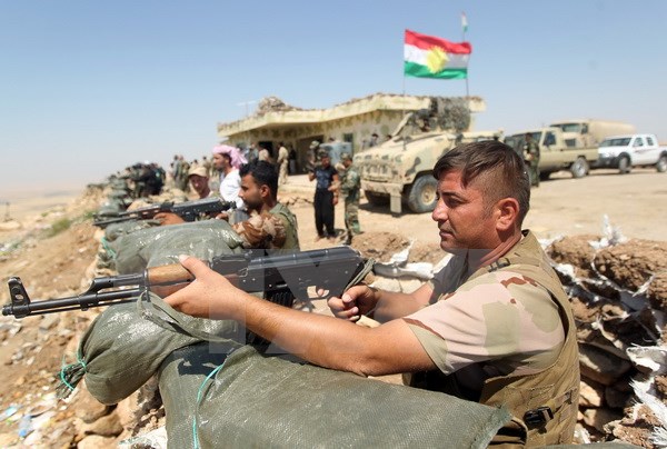 Các chiến binh người Kurd tại khu vực thị trấn Bashiqa. (Nguồn: AFP/TTXVN)