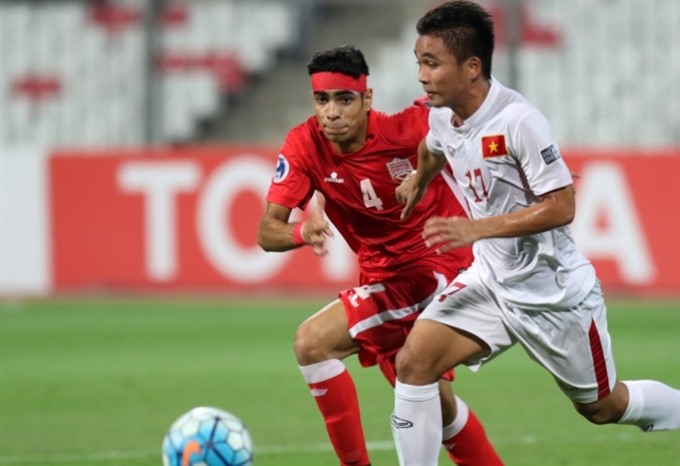 Việt Nam vs Bahrain in the quarter-final match of the AFC U19 Championship on Sunday. Việt Nam will meet Japan in the semi-finals. — Photo the-afc.com  Read more at http://vietnamnews.vn/sports/345035/vn-to-meet-japan-in-afc-u19-semi-finals.html#R6mpcyS1tK4xTD9m.99