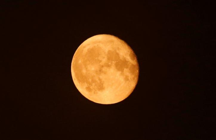  The super moon appears in the sky in Cairo, Egypt, in this file photo taken October 17, 2016.