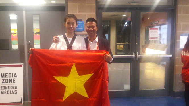 Ho Thi Kim Ngan and her coach Tran Anh Tuan