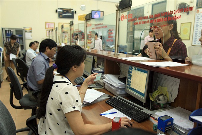 The online tax refund pilot project would be implemented in 13 municipal taxation departments this year and expanded next year. — Photo thanhnien.vn  Read more at http://vietnamnews.vn/economy/346983/online-tax-refund-soon-in-13-cities-provinces.html#3A4sLRAzwWk88XTd.99