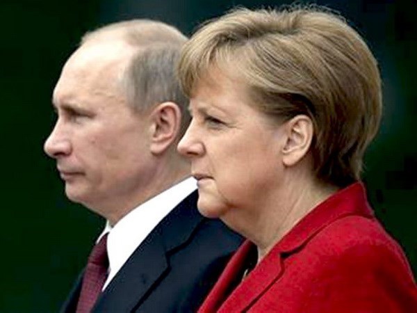 Thủ tướng Đức Merkel và Tổng thống Nga Putin. (Nguồn: AP)