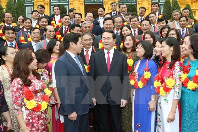 President Tran Dai Quang and delegates at the meeting