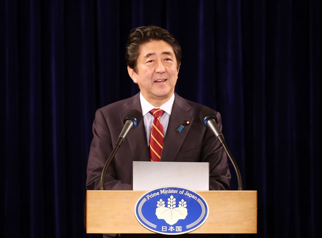 Prime Minister Shinzo Abe speaks at a press conference in Hanoi on January 16