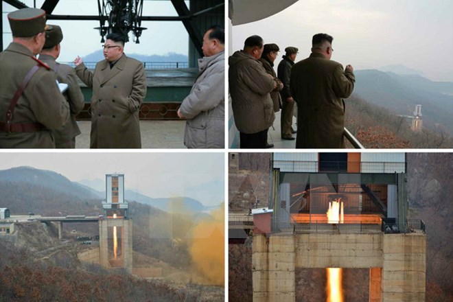 Nhà lãnh đạo Triều Tiên Kim Jong-un theo dõi vụ thử động cơ tên lửa ở bãi phóng vệ tinh Sohae. (Nguồn: YONHAP/TTXVN)