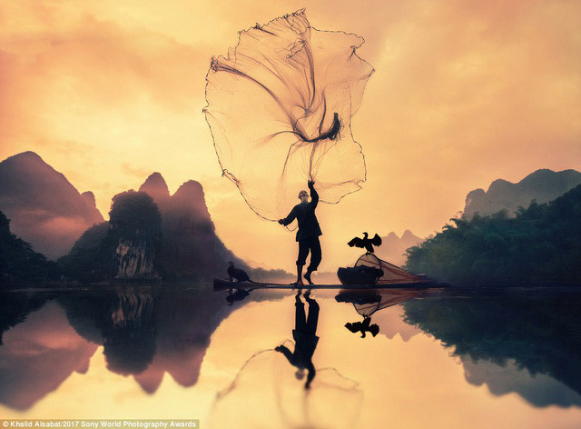 The first prize was given to a Saudi Arabian photographer in the National Awards category. Pictured is a Chinese old man throwing the fishing net