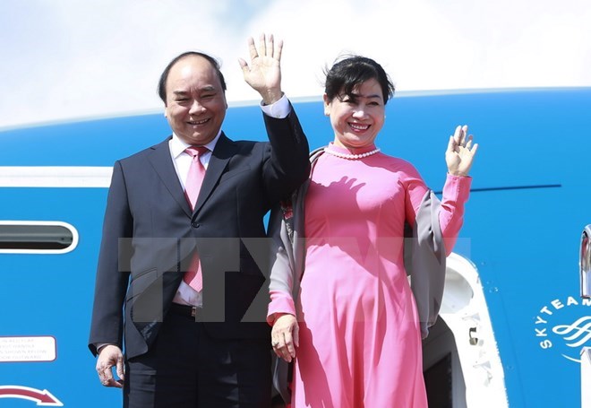 Prime Minister Nguyen Xuan Phuc and his spouse arrive at Haneda International Airport in Tokyo on June 4 