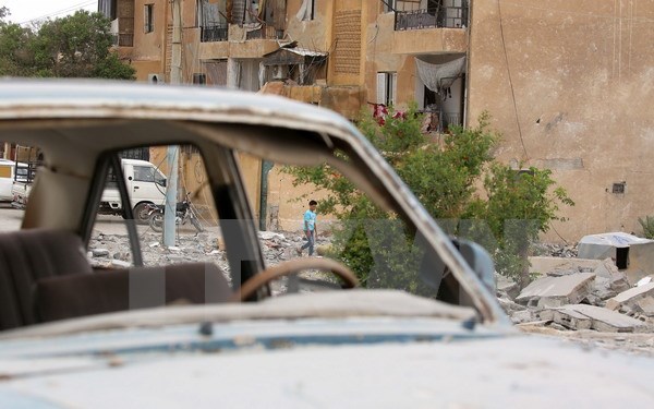 Syria tố Mỹ không kích bằng phốtpho trắng làm hàng chục người chết