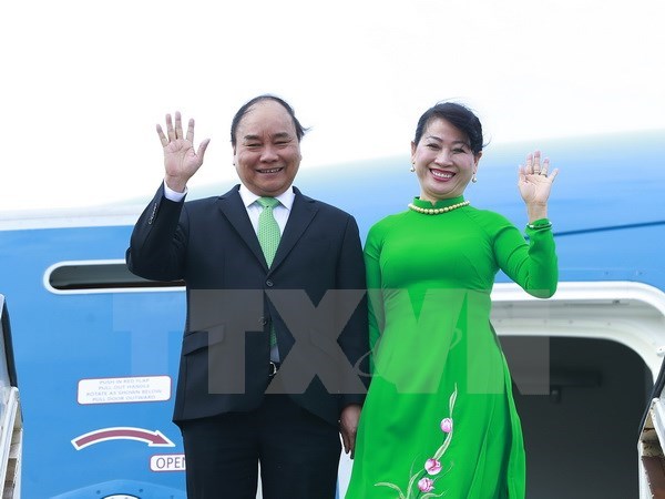 Prime Minister Nguyen Xuan Phuc and his spouse arrive at Amsterdam Airport Schiphol, the Netherlands on July 8.