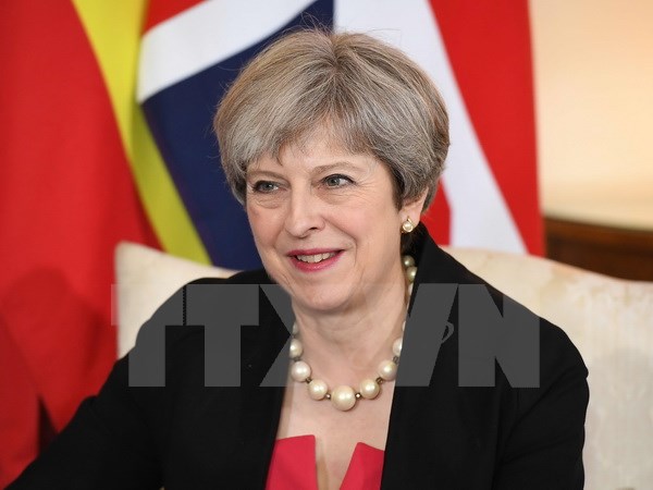 Thủ tướng Anh Theresa May tại một sự kiện ở London ngày 13/7. (Nguồn: AFP/TTXVN)