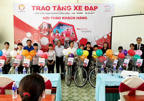 Presenting bicycles for studious poor students