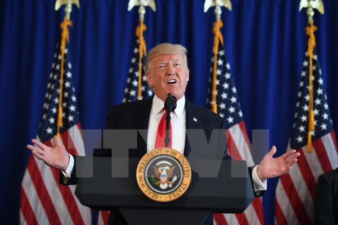 Tổng thống Mỹ Donald Trump trả lời báo giới tại Bedminster, New Jersey, Mỹ ngày 12/8. (Nguồn: AFP/TTXVN)