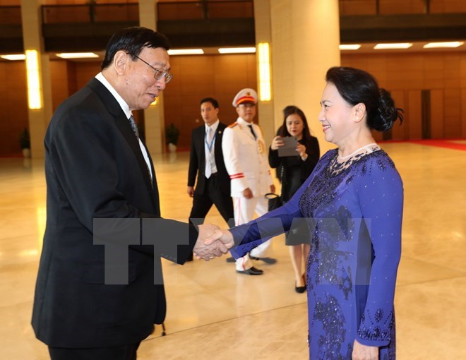 President of the National Legislative Assembly (NLA) of Thailand Pornpetch Wichitcholchai (L) meets with ational Assembly Chairwoman Nguyen Thi Kim Ngan