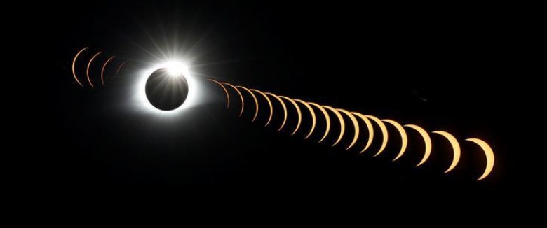 A composite image of 21 separate photographs taken with a single fixed camera shows the solar eclipse as it creates the effect of a diamond ring at totality as seen from Clingmans Dome, which at 6,643 feet (2,025m) is the highest point in the Great Smoky Mountains National Park, Tennessee, U.S. August 21, 2017. Location coordinates for this image are 35º33'24" N, 83º29'46" W.