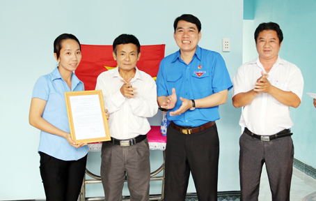 Handing over house for poor young people
