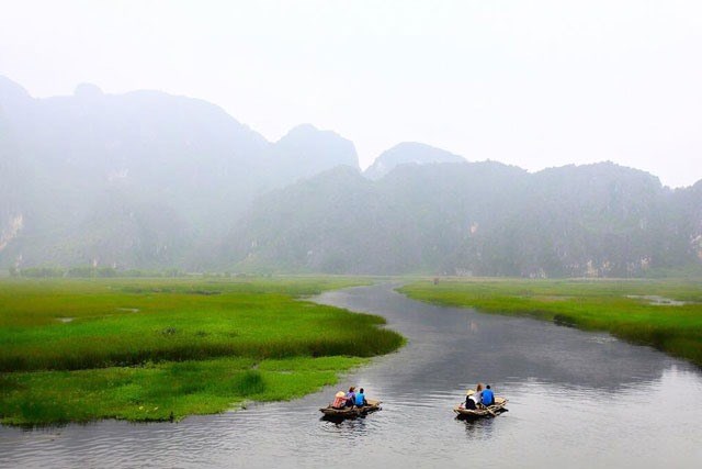 A boat tour on Van Long Lagoon