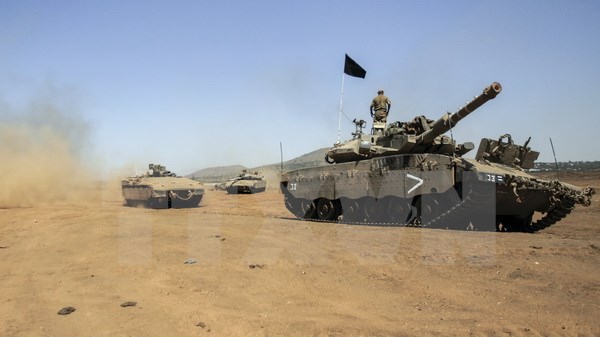 Binh sỹ Israel trong cuộc tập trận tại khu vực cao nguyên Golan. (Nguồn: AFP/TTXVN)