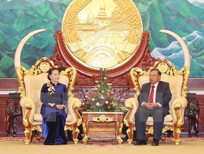 NA Chairwoman Nguyen Thi Kim Ngan (L) and General Secretary of the Lao People’s Revolutionary Party (LPRP) and State President Bounnhang Volachith