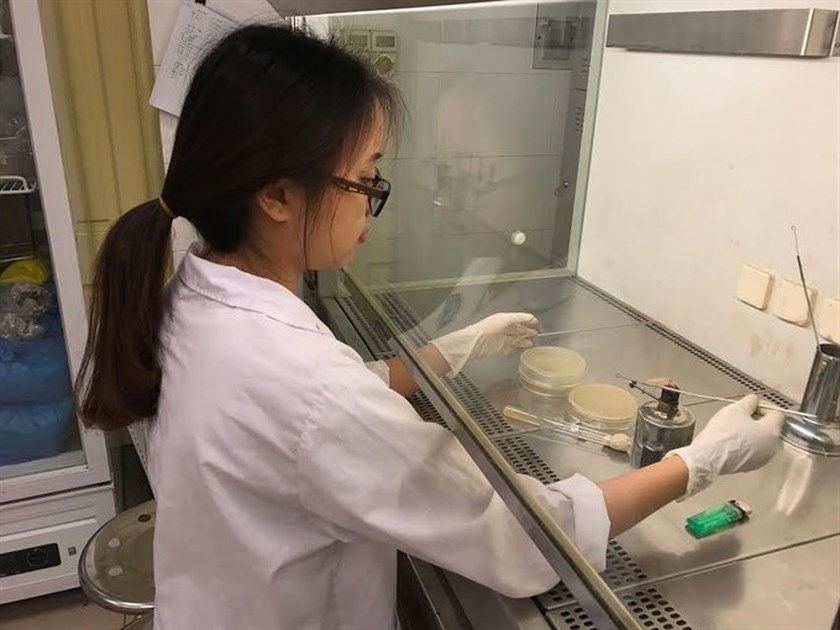 Vu Thi Mai Anh spent most of time in a university laboratory while conducting research on the use of basa fish fat to produce bio-plastics.