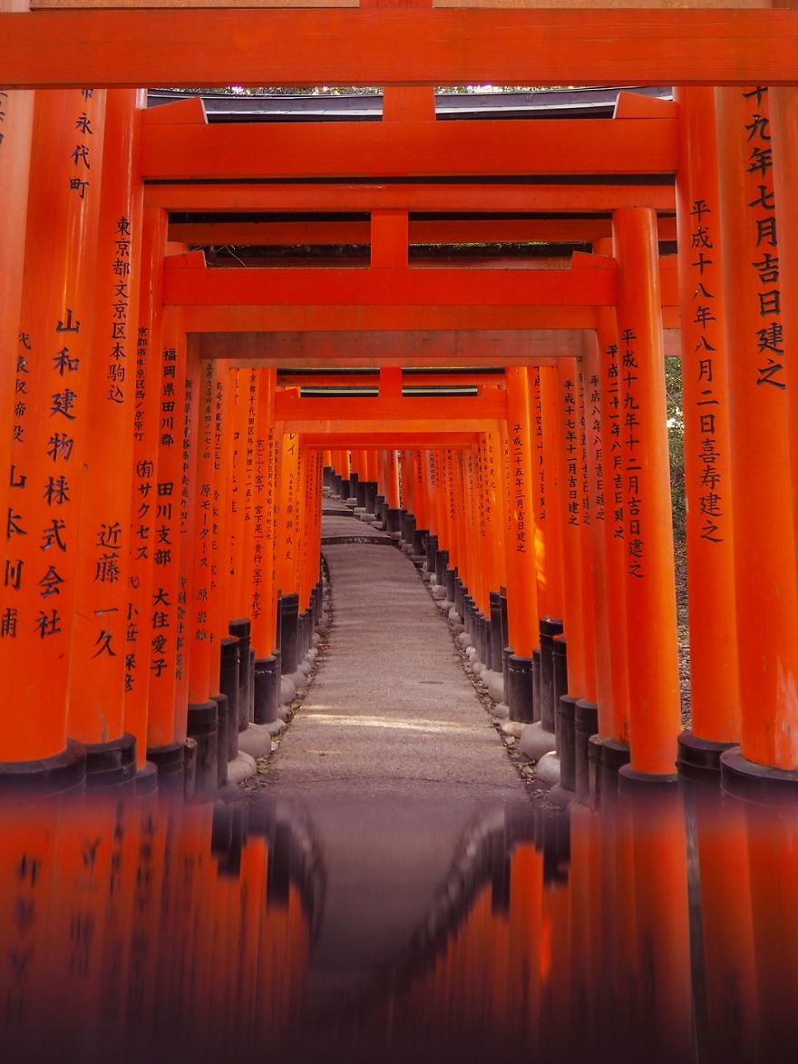 Waiting for ages while the crowds filtered through between the torii gates, I was finally able to capture a reflection of these ruby red gates using my phone screen.